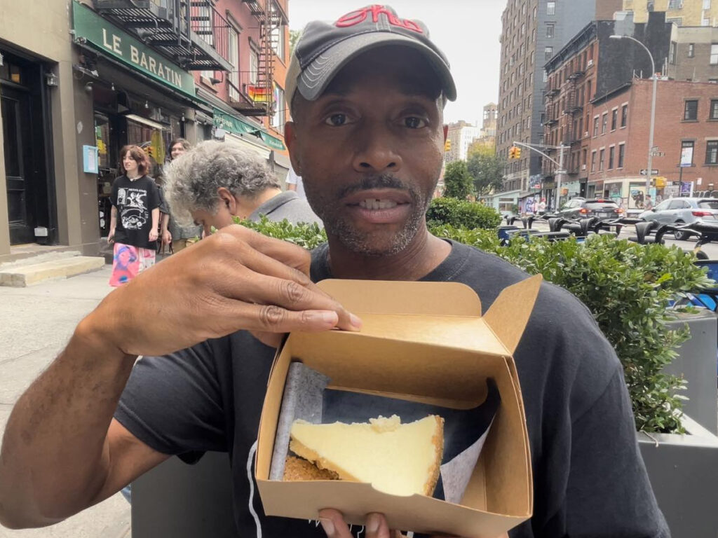 Matt DV WIlliams about to dig into this cheesecake in New York City.